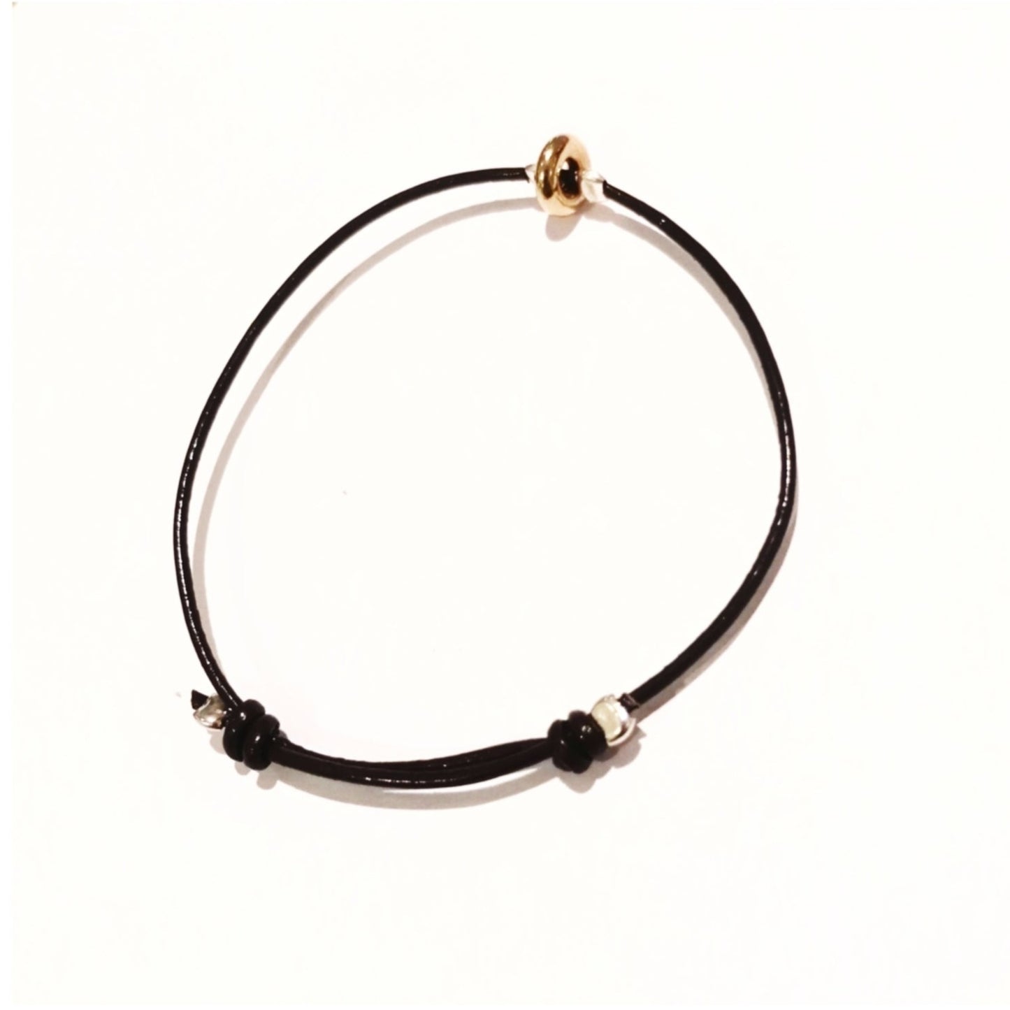 Bracelet cuir plaque or et argent