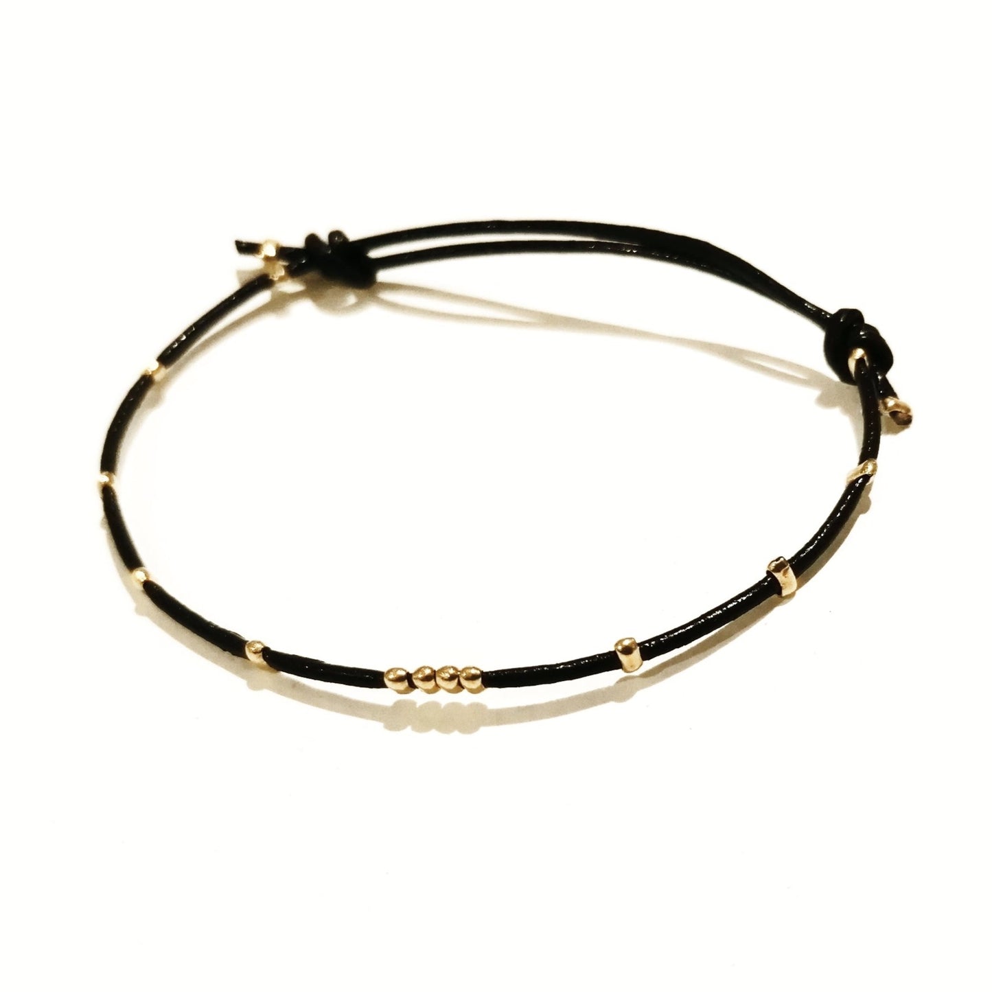 Bracelet cuir plaque or et argent