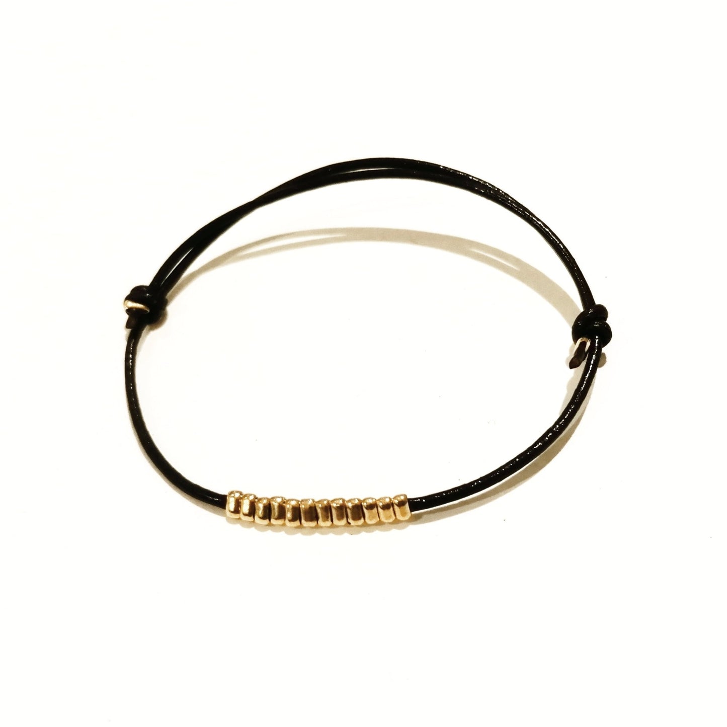 Bracelet cuir et plaque or