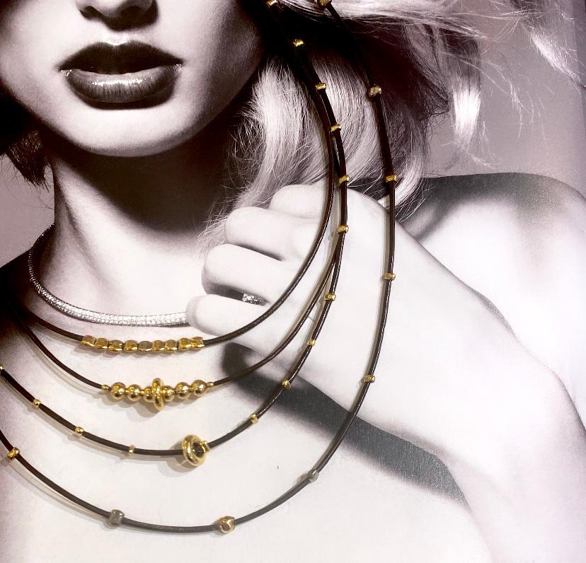 Collier cuir plaque or et argent